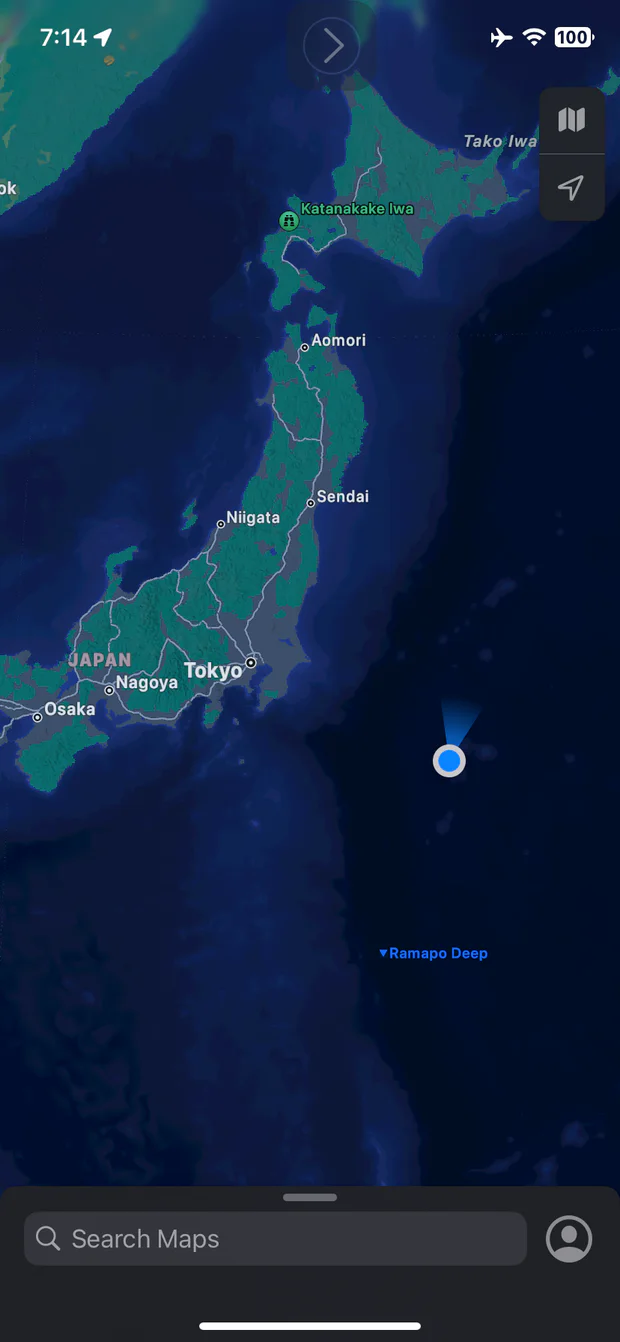 Apple Maps result from an independent WPS response-rewrite experiment, with a blue location marker east of Japan
